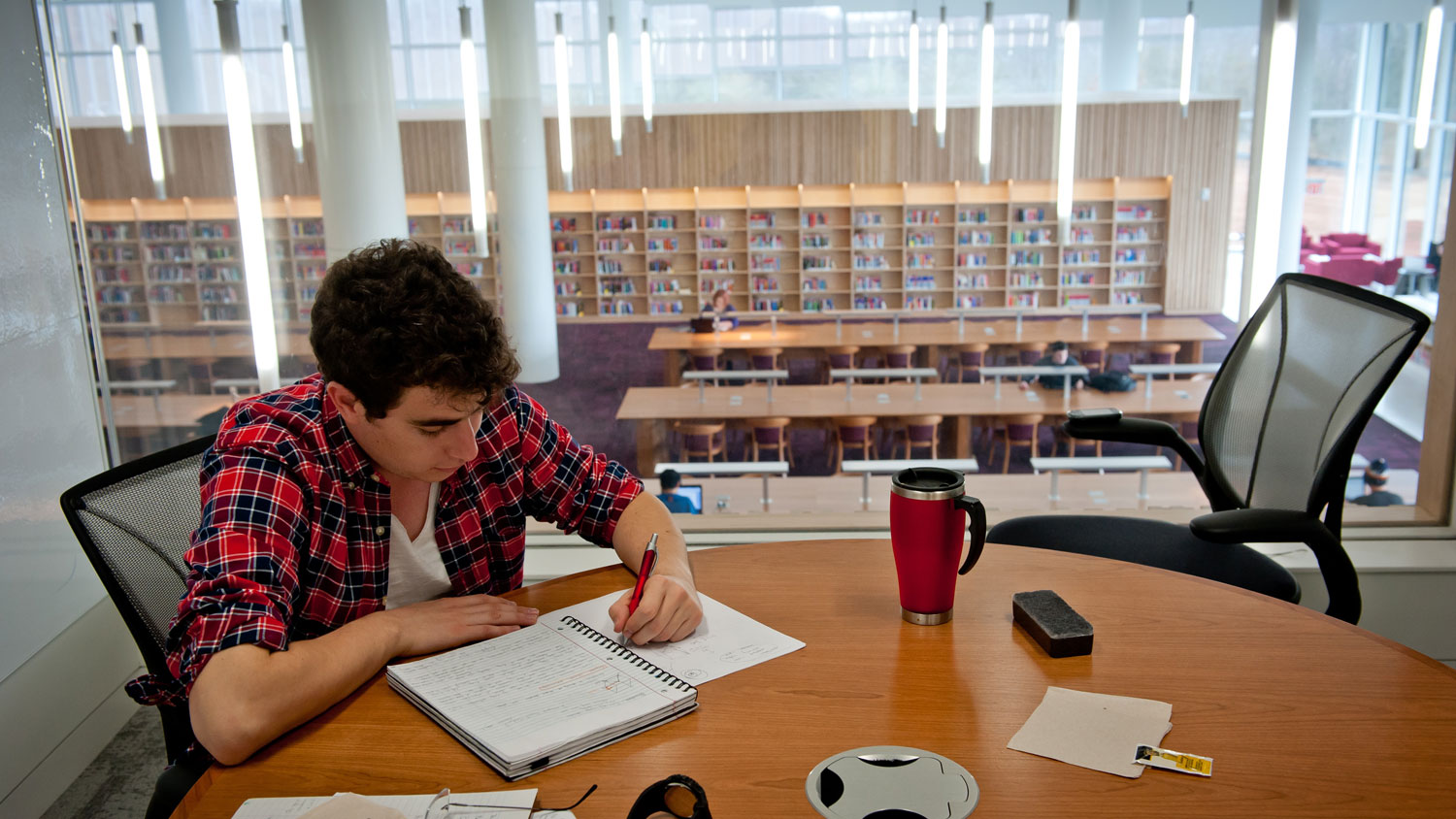 student studying in Hunt library